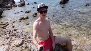 Russian teen walks on the beach and shows his cock in public, but he was seen