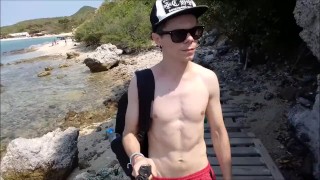Russian teen walks on the beach and shows his cock in public, but he was seen