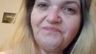 Trying to talk while giving a blowjob to Dildo, wearing open mouth gag