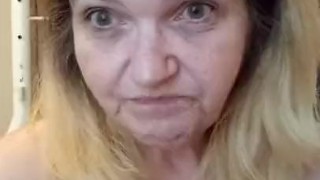 Trying to talk while giving a blowjob to Dildo, wearing open mouth gag