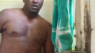 In the shower playing with my thick black cock