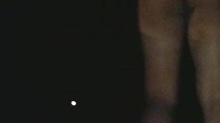 Sissy in heat fucking her ass with dildo in the streets at night