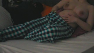 Preggo woman loves to masturbate and orgasm near her husband in bed