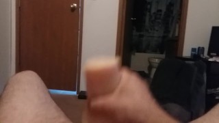 Guy playing with toy, cumshot at end