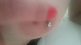 Play with my pierced nipples with silver vibrator
