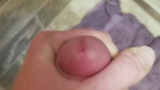 Solo jerking cock with cum shot