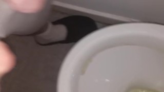 Boy pissing toilet