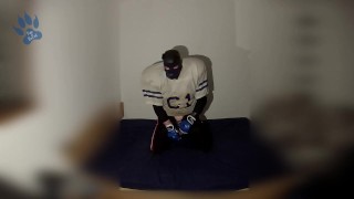 Rufus pawing off in Football Gear