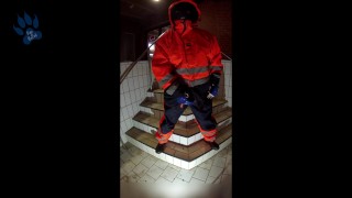 Rufus pawing off in Raingear