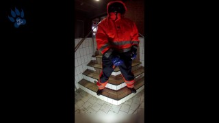 Rufus pawing off in Raingear