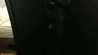 Slave encased in latex vacuum tower