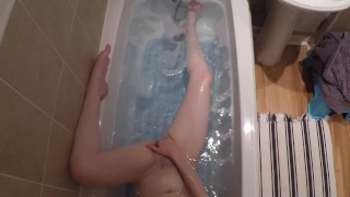  Petite MILF having a bath and masturbating