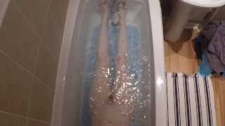 Petite MILF having a bath and masturbating