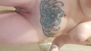 Peeing standing up in bathtub full bladder