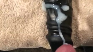 Cumming on a huge black dildo