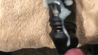 Cumming on a huge black dildo