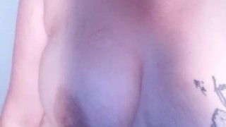Blonde fucking herself with vibrator while playing with tits