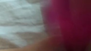 Masturbating