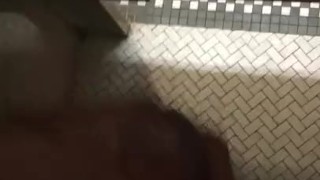 Jacking off in public restroom