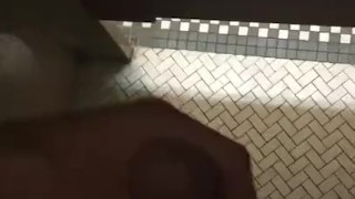 Jacking off in public restroom