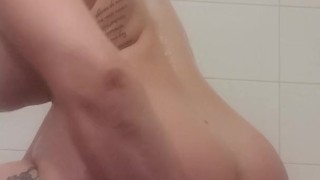 Milf playing with a huge dildo in the shower