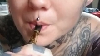 Smoking sexy eyes face tattoos