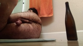 Bottle anal orgasm: man inserts bottles in his ass, cums twice handsfree