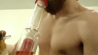Shirtless bong rip