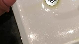Pissing in the sink at work