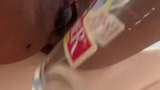 Squirting into empty glass with a drink at the end