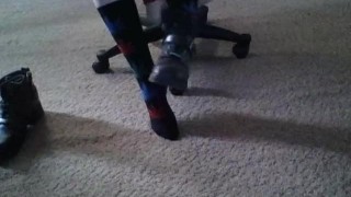 Becky putting on socks and Harley boots