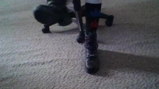 Becky putting on socks and Harley boots