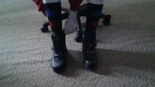 Becky putting on socks and Harley boots