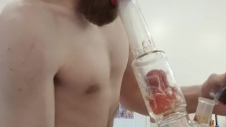 Shaking my grinder for kief and taking a hit