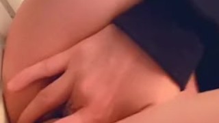 Girl fingers herself and licks the juice off her fingers