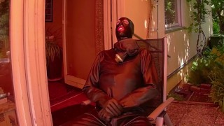 Rubbersfinest Maske mit Zungenknebel mit Hazmatsuit