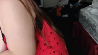 being Mrs Kitty and playing with my boobs.