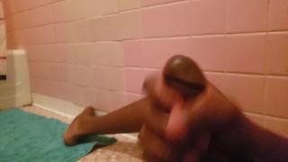 In the bathroom playing with my black cock