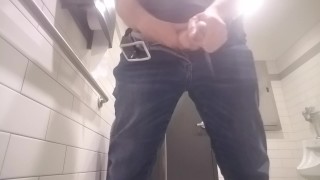 college bro pissing in public toilet