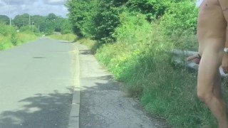 Naked with a semi in the road