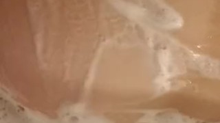 Soapy shower watch the foam slip over my ass