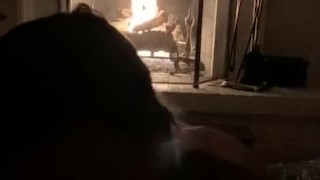 Sexy ass bitch sucks cock in front of the fireplace