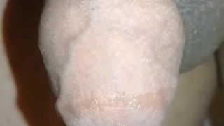 Slowmotion precum drool with foreskin hanging up close and personal