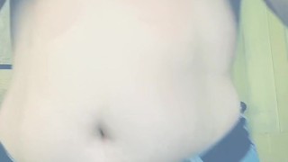 Chubby girl shakes her tits for camera