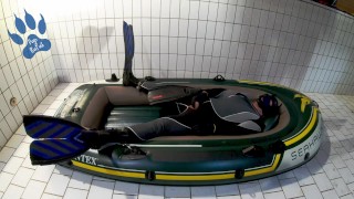 Wetsuit, Fins and Boat - geared pup pawing off