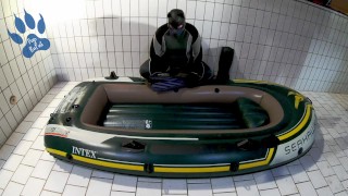 Wetsuit, Fins and Boat - geared pup pawing off