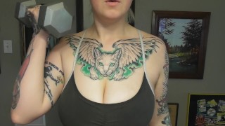 CHUBBY TATTOOED GIRL DOING BICEP CURLS