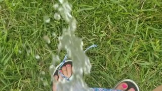 Short Girl Standing Pee Outside In Grass