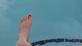 Kitty's splashes in pool