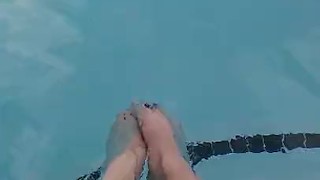 Kitty's splashes in pool